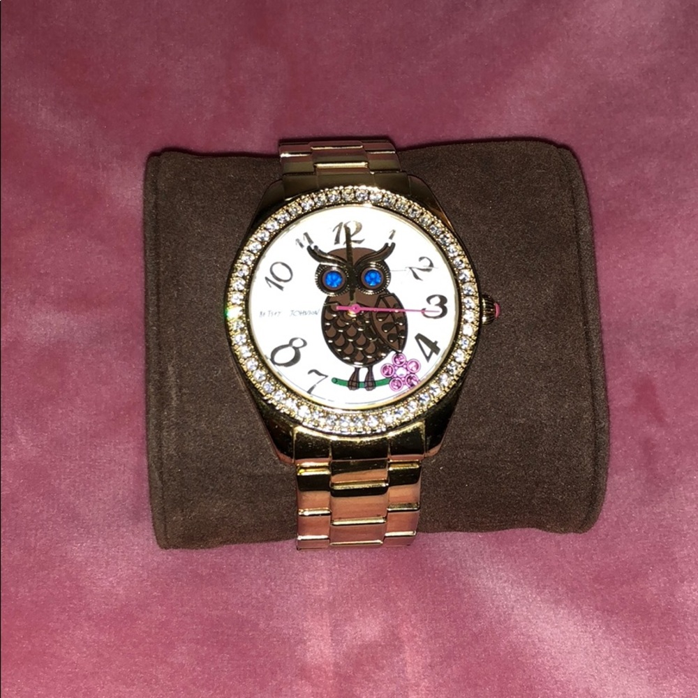Gold Betsey Johnson watch with an owl on the face